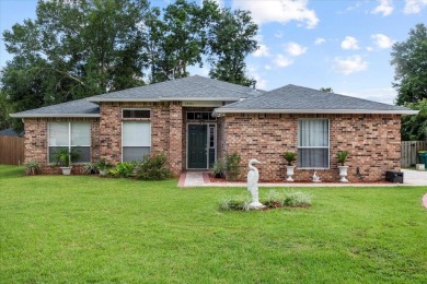 This must-see all brick home is nestled in the sought-after on Fairway Oaks at Magnolia Golf Course in Florida - for sale on GolfHomes.com, golf home, golf lot