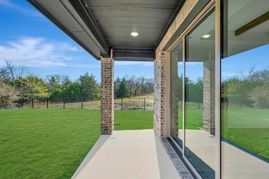 Fabulous two-story home located at Heath Golf and Yacht Club in on Heath Golf and Yacht Club in Texas - for sale on GolfHomes.com, golf home, golf lot