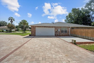 This must-see all brick home is nestled in the sought-after on Fairway Oaks at Magnolia Golf Course in Florida - for sale on GolfHomes.com, golf home, golf lot
