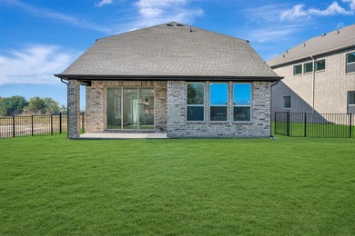 Fabulous two-story home located at Heath Golf and Yacht Club in on Heath Golf and Yacht Club in Texas - for sale on GolfHomes.com, golf home, golf lot