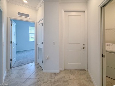 This spacious top floor, end unit, 3-bedroom, move-in ready on Panther Run Golf Club in Florida - for sale on GolfHomes.com, golf home, golf lot