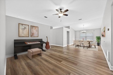 This must-see all brick home is nestled in the sought-after on Fairway Oaks at Magnolia Golf Course in Florida - for sale on GolfHomes.com, golf home, golf lot