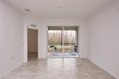 This spacious top floor, end unit, 3-bedroom, move-in ready on Panther Run Golf Club in Florida - for sale on GolfHomes.com, golf home, golf lot