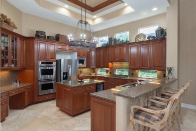 Welcome to this stunning estate home offering almost 4,500 sq on BallenIsles Golf and Country Club in Florida - for sale on GolfHomes.com, golf home, golf lot