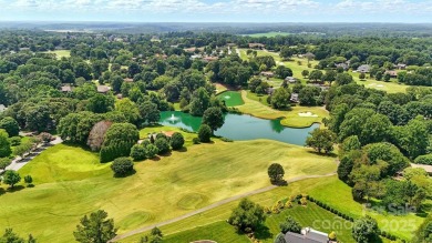 Large and cleared, perfectly sloping lot in Rock Barn Country on Rock Barn Golf and Spa in North Carolina - for sale on GolfHomes.com, golf home, golf lot