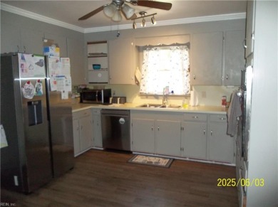 Well maintained brick ranch with a short walk between the hedges on Cypress Cove Country Club in Virginia - for sale on GolfHomes.com, golf home, golf lot