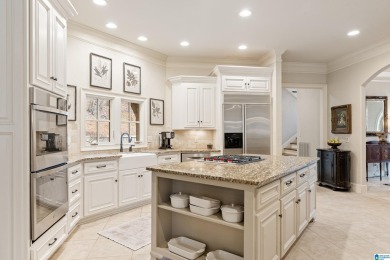 This grand Greystone home is nestled within its wooded  private on Greystone Golf and Country Club-Founders Course in Alabama - for sale on GolfHomes.com, golf home, golf lot