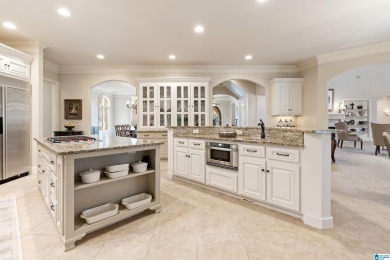 This grand Greystone home is nestled within its wooded  private on Greystone Golf and Country Club-Founders Course in Alabama - for sale on GolfHomes.com, golf home, golf lot