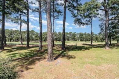 Step into this charming two-bedroom, two-bathroom first-floor on Myrtlewood Golf Course and Club  in South Carolina - for sale on GolfHomes.com, golf home, golf lot