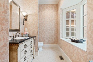 This grand Greystone home is nestled within its wooded  private on Greystone Golf and Country Club-Founders Course in Alabama - for sale on GolfHomes.com, golf home, golf lot