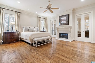 This grand Greystone home is nestled within its wooded  private on Greystone Golf and Country Club-Founders Course in Alabama - for sale on GolfHomes.com, golf home, golf lot