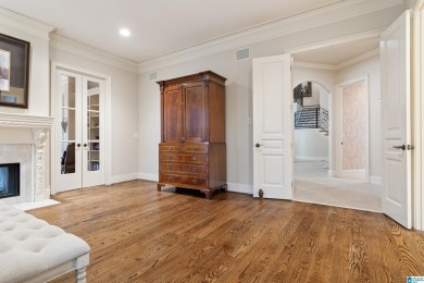 This grand Greystone home is nestled within its wooded  private on Greystone Golf and Country Club-Founders Course in Alabama - for sale on GolfHomes.com, golf home, golf lot