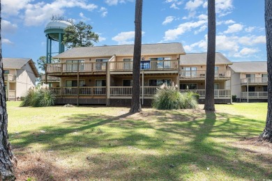 Step into this charming two-bedroom, two-bathroom first-floor on Myrtlewood Golf Course and Club  in South Carolina - for sale on GolfHomes.com, golf home, golf lot