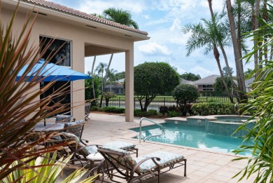 Welcome to this stunning estate home offering almost 4,500 sq on BallenIsles Golf and Country Club in Florida - for sale on GolfHomes.com, golf home, golf lot