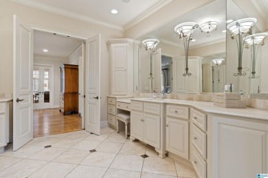 This grand Greystone home is nestled within its wooded  private on Greystone Golf and Country Club-Founders Course in Alabama - for sale on GolfHomes.com, golf home, golf lot