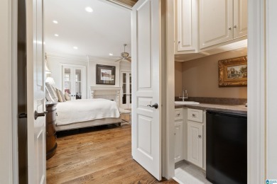 This grand Greystone home is nestled within its wooded  private on Greystone Golf and Country Club-Founders Course in Alabama - for sale on GolfHomes.com, golf home, golf lot