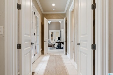This grand Greystone home is nestled within its wooded  private on Greystone Golf and Country Club-Founders Course in Alabama - for sale on GolfHomes.com, golf home, golf lot