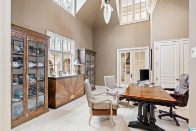 This grand Greystone home is nestled within its wooded  private on Greystone Golf and Country Club-Founders Course in Alabama - for sale on GolfHomes.com, golf home, golf lot