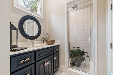 This grand Greystone home is nestled within its wooded  private on Greystone Golf and Country Club-Founders Course in Alabama - for sale on GolfHomes.com, golf home, golf lot