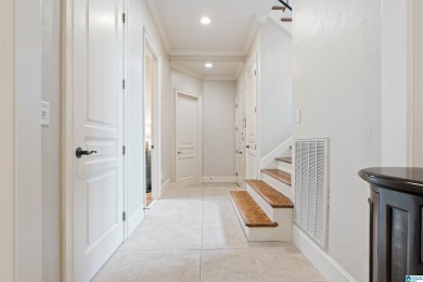 This grand Greystone home is nestled within its wooded  private on Greystone Golf and Country Club-Founders Course in Alabama - for sale on GolfHomes.com, golf home, golf lot
