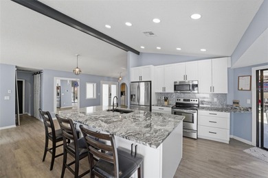 Under contract-accepting backup offers. Tucked onto a generous 0 on Spring Hill Golf Course in Florida - for sale on GolfHomes.com, golf home, golf lot