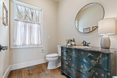 This grand Greystone home is nestled within its wooded  private on Greystone Golf and Country Club-Founders Course in Alabama - for sale on GolfHomes.com, golf home, golf lot