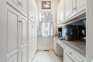 This grand Greystone home is nestled within its wooded  private on Greystone Golf and Country Club-Founders Course in Alabama - for sale on GolfHomes.com, golf home, golf lot