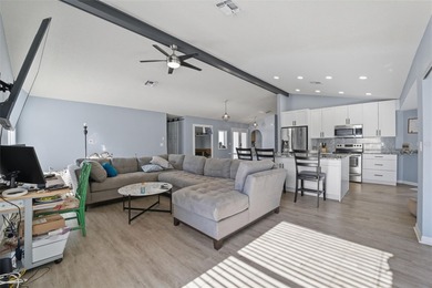 Under contract-accepting backup offers. Tucked onto a generous 0 on Spring Hill Golf Course in Florida - for sale on GolfHomes.com, golf home, golf lot