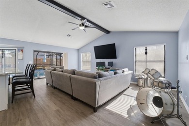 Under contract-accepting backup offers. Tucked onto a generous 0 on Spring Hill Golf Course in Florida - for sale on GolfHomes.com, golf home, golf lot