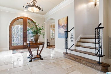 This grand Greystone home is nestled within its wooded & private on Greystone Golf and Country Club-Founders Course in Alabama - for sale on GolfHomes.com, golf home, golf lot