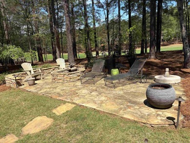 Don't miss this well cared for 4 sided brick home overlooking on Reynolds Lake Oconee - The Oconee in Georgia - for sale on GolfHomes.com, golf home, golf lot