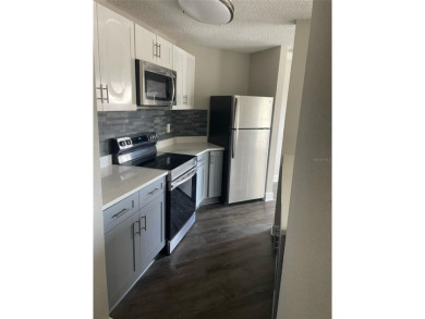 FULLY RENOVATED 2-beds/2baths condo move in ready condition and on Ventura Country Club in Florida - for sale on GolfHomes.com, golf home, golf lot