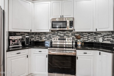 Perfect for downsizing or as a second home, this immaculate on Members Club At St. James Plantation in North Carolina - for sale on GolfHomes.com, golf home, golf lot