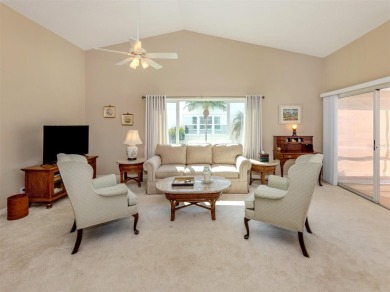 TRANQUILITY MEETS ELEGANCE WITH PICTURESQUE WATER VIEWS! Welcome on Venice East Golf Club in Florida - for sale on GolfHomes.com, golf home, golf lot