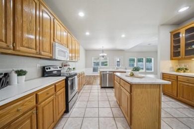Elegant Golf Course Living | Immaculate 4-Bed, 3-Bath Brick Home on Battle Creek Golf Course in Oklahoma - for sale on GolfHomes.com, golf home, golf lot