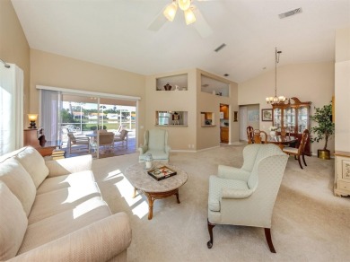 TRANQUILITY MEETS ELEGANCE WITH PICTURESQUE WATER VIEWS! Welcome on Venice East Golf Club in Florida - for sale on GolfHomes.com, golf home, golf lot