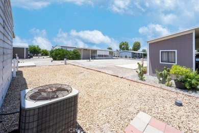 **Charming 2 Bed/2 Bath Mobile Home in a Vibrant 55+ Golf Resort on Hemet West Mobile Estates in California - for sale on GolfHomes.com, golf home, golf lot