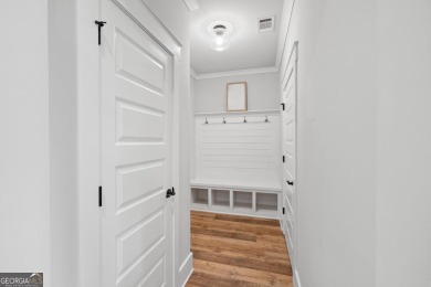 This beautiful 4 bedroom, 3 bath home offers the perfect blend on Harbor Club Golf and Country Club in Georgia - for sale on GolfHomes.com, golf home, golf lot