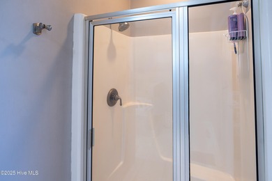 Perfect for downsizing or as a second home, this immaculate on Members Club At St. James Plantation in North Carolina - for sale on GolfHomes.com, golf home, golf lot