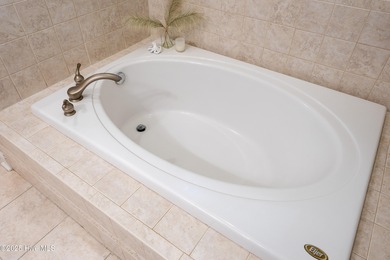 Perfect for downsizing or as a second home, this immaculate on Members Club At St. James Plantation in North Carolina - for sale on GolfHomes.com, golf home, golf lot