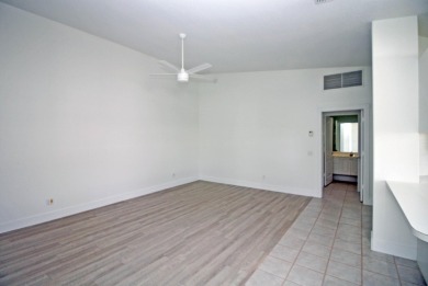 A wonderful opportunity awaits with this lakeside Capri 3 villa on Lost Lake Golf Club in Florida - for sale on GolfHomes.com, golf home, golf lot