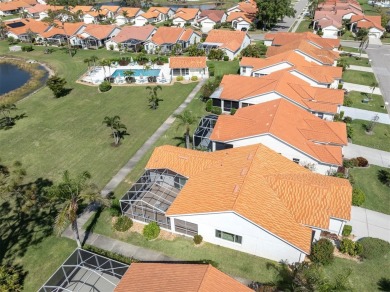 TRANQUILITY MEETS ELEGANCE WITH PICTURESQUE WATER VIEWS! Welcome on Venice East Golf Club in Florida - for sale on GolfHomes.com, golf home, golf lot