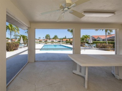 TRANQUILITY MEETS ELEGANCE WITH PICTURESQUE WATER VIEWS! Welcome on Venice East Golf Club in Florida - for sale on GolfHomes.com, golf home, golf lot