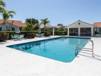 TRANQUILITY MEETS ELEGANCE WITH PICTURESQUE WATER VIEWS! Welcome on Venice East Golf Club in Florida - for sale on GolfHomes.com, golf home, golf lot