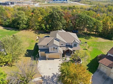 Welcome home to this beautiful 5-bedroom, 4.5-bath residence in on Falcon Valley Golf Course in Kansas - for sale on GolfHomes.com, golf home, golf lot