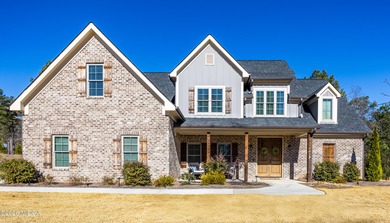 Better than new and beautifully maintained, this 4-year-old 4 on The Club River Forest in Georgia - for sale on GolfHomes.com, golf home, golf lot