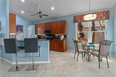 Beautifully maintained Laurel model offering 3 bedrooms and 3 on Shadow Wood Country Club in Florida - for sale on GolfHomes.com, golf home, golf lot