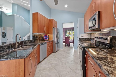 Beautifully maintained Laurel model offering 3 bedrooms and 3 on Shadow Wood Country Club in Florida - for sale on GolfHomes.com, golf home, golf lot
