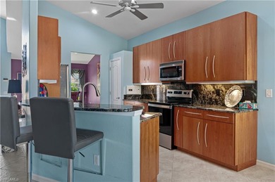 Beautifully maintained Laurel model offering 3 bedrooms and 3 on Shadow Wood Country Club in Florida - for sale on GolfHomes.com, golf home, golf lot