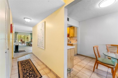 Spacious 2-bed, 1.5-bath condo in Fairways of Tamarac 55+ on Colony West Country Club in Florida - for sale on GolfHomes.com, golf home, golf lot